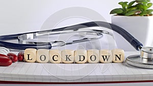 LOCKDOWN word made with building blocks, medical concept background