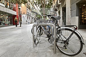 Locked bikes on an urban street