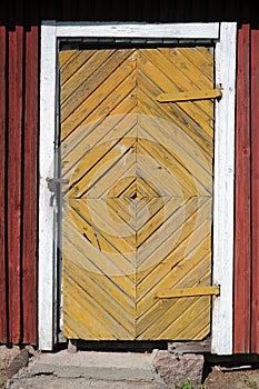 Locked door of old village house