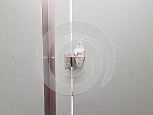 Locked or latched bathroom or restroom stall door