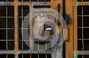 Locked in or locked out? Old Locked Metal Grate Door