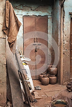 A locked metal door of a workshop