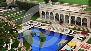 Locked-on shot of swimming pool area of Hotel Amar Villas, Agra, Uttar Pradesh, India