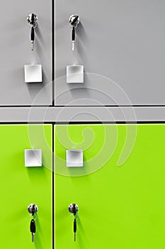 Lockers cabinets in a locker room at school or museum or station.Closeup padlock with key number hanging on locker for concept