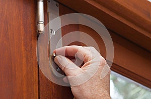Locking the door to keep your house or office safe and secure