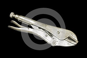 Locking Pliers isolated on black background