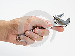 Locking pliers in the mechanics hand.