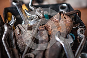 Locking pliers and wrench in tool box