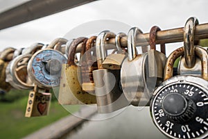 Locks on a bridge railing in Ottawa symbolizing love