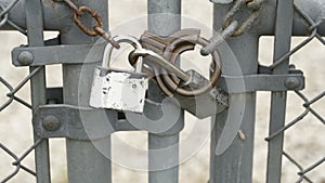 Locks and Chain on Fence