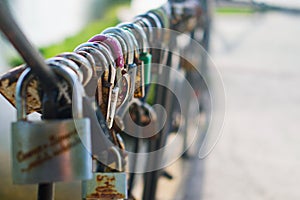 Locks of love symbol for everlasting friendship. Select focus on blur background