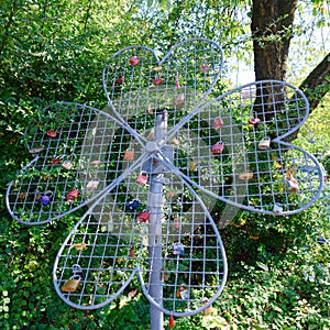 Locks on special heart shaped grid beneed River Wupper in Leichlingen, Germany. Celebrating everlasting love with latching lock.