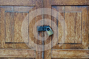 Lockset on the door wooden pattern textured background.