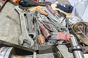 Locksmith box with keys, screwdrivers and a tool for equipment repair