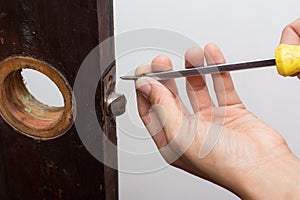 Locksmith fix lock on wooden door