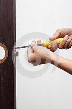 Locksmith fix lock on wooden door