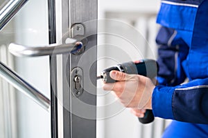 Locksmith Man Repairing photo