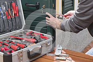 Locksmith repair the door lock