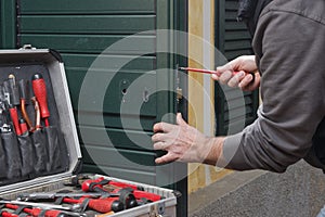 Locksmith repair the door lock photo