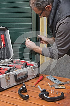 Locksmith repair the door lock