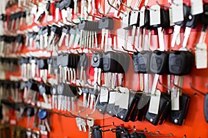 Locksmith stand with car keys on hooks photo