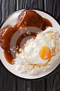 Loco moco is a dish featured in contemporary Hawaiian cuisine consists of white rice, topped with a hamburger, a fried egg, and