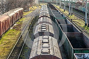 The locomotive drags freight cars