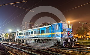 Locomotive with a freight train at Agra Cantonment railway station. India