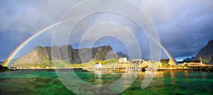 Lofoten fishing village with rainbow