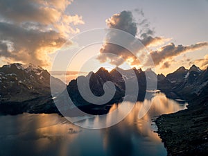 Lofoten islands, Norway Dramatic sunset clouds moving over steep mountain peaks