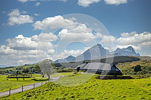 Lofotr long house, a home for vikings in the viking era, during daytime with white clouds.