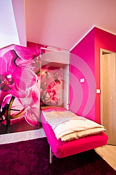 Loft bedroom conversion with orchid theme