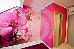 Loft conversion with orchid theme decoration