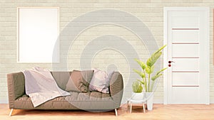 Mock up Loft room interior with gray sofa and plants on wooden floor and white brick wall background.3D rendering