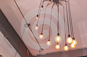 Loft style of light bulbs for decorated interior room of cafe