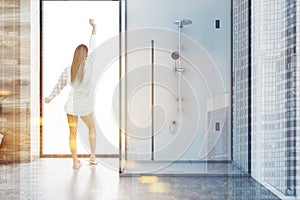 Loft white shower in bathroom interior, woman