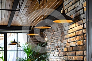 Loftstyle interior with brick wall wooden ceiling and black ceiling lamp. Concept Loftstyle