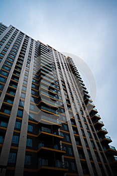 Lofty Apartment Tower Under Overcast Sky