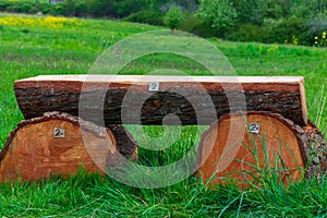 Log Bench Sitting in Field