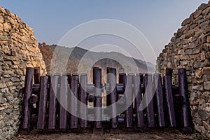 Log blockade at fortress gate