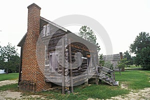 Log cabin with fireplace in historic Camden, SC photo