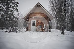 A log cabin in the snow
