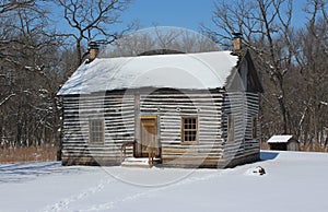 Log Cabin with Two Chimneys with Snow Cover