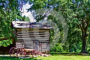 Log Cabin with Wagon in Hagan-Stone Park photo