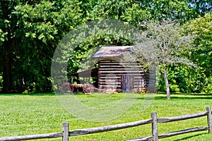 Log Cabin with Wagon at Hagan-Stone Park photo