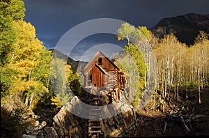 Log cabin in woods photo