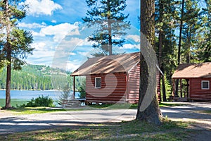 Log Cabins in Forest and on Lake