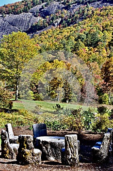 Log chairs around a stump table in autumn, Lonesome Valley, western North Carolina