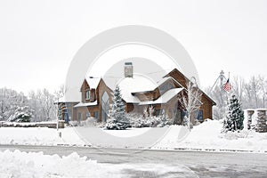 Log Home In The Snow