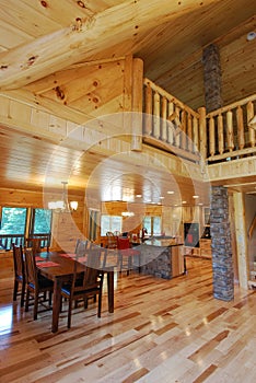Log house kitchen and dining interior